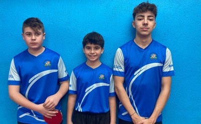 Els jugadors del CTT Ripollet, Iker, Lucas i Pau, en la competició de promeses..